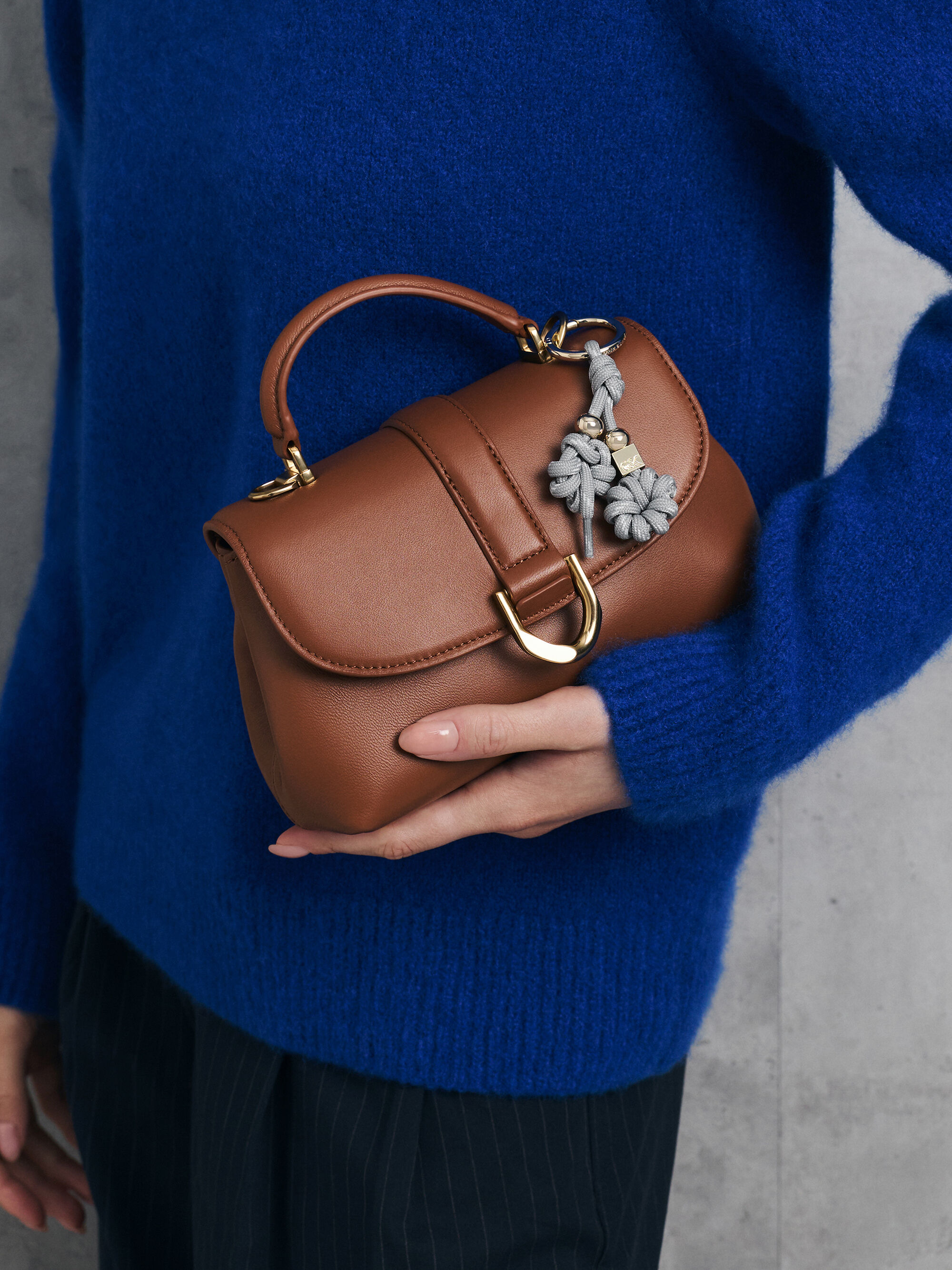 Gabine ガビーヌ レザートラペーズトップハンドルバッグ