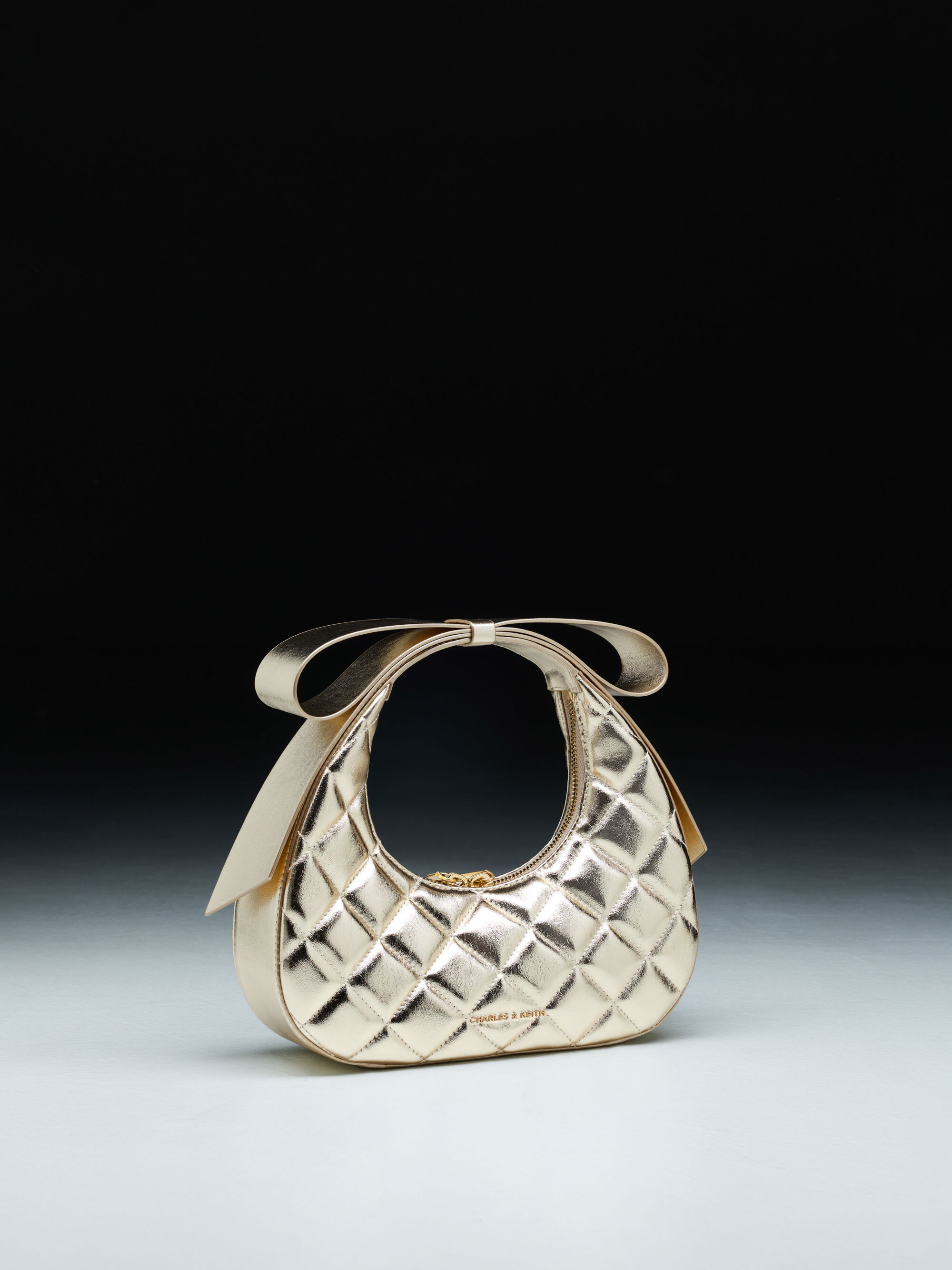 Janie ジェイニー キルトボウハンドル クレセントバッグ - シャンパン