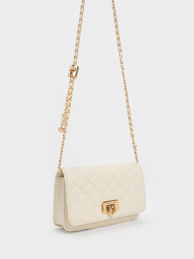 Cressida クレシダ キルトプッシュロッククラッチ - クリーム 