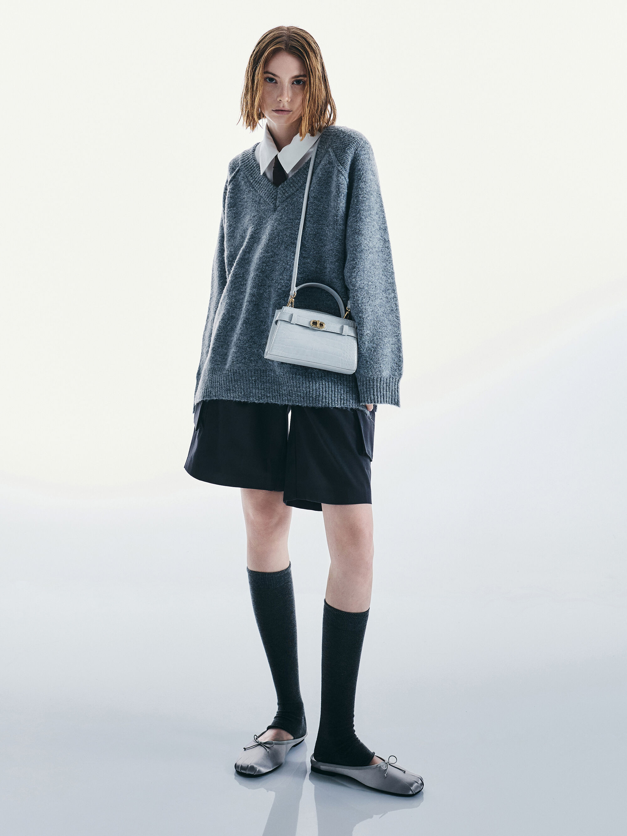 Aubrielle オブリエル クロックエフェクトトップハンドルバッグ