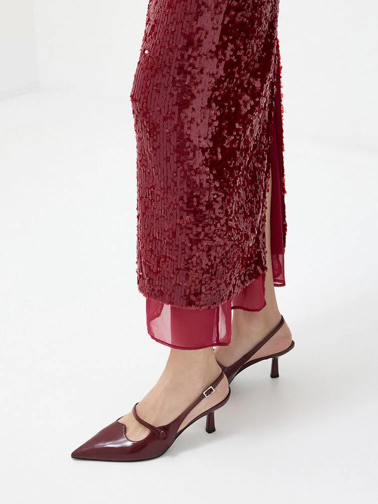 Burgundy slingbacks styled with a red dress.