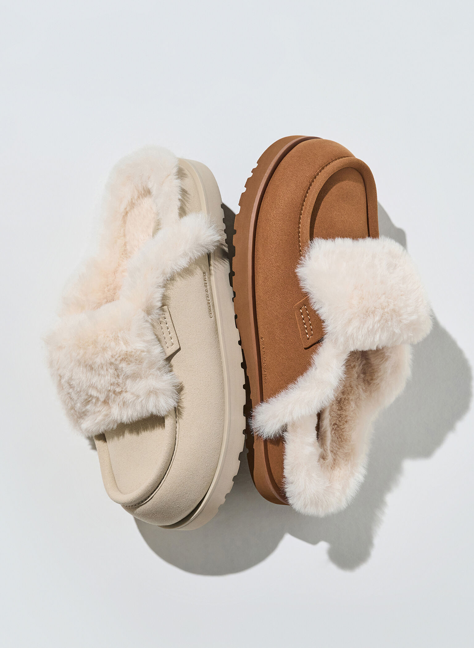 Flatform mules lined with faux shearling offer  warmth and protection during winter.