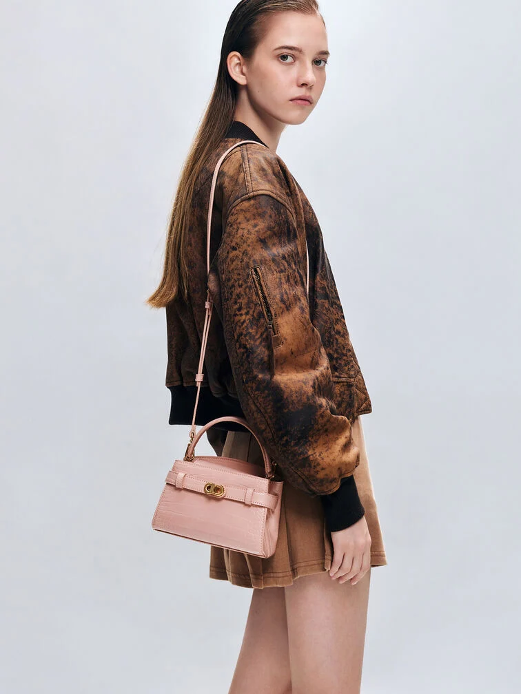 CHARLES & KEITHのベストセラーパーティーバッグの一つ、レディースAubrielleクロコ風トップハンドルバッグ。