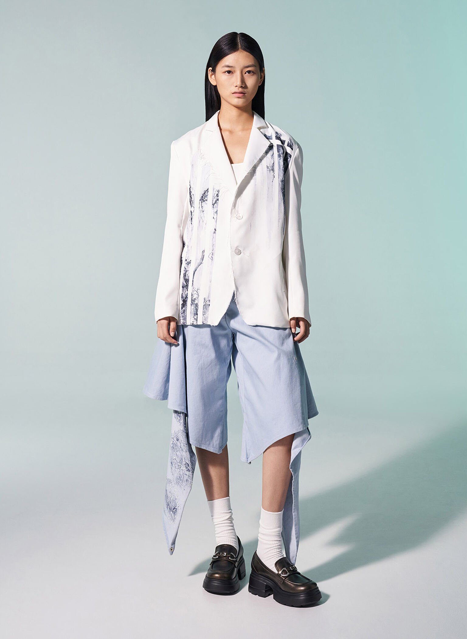 Bronze chunky platform loafers styled with white crew socks.