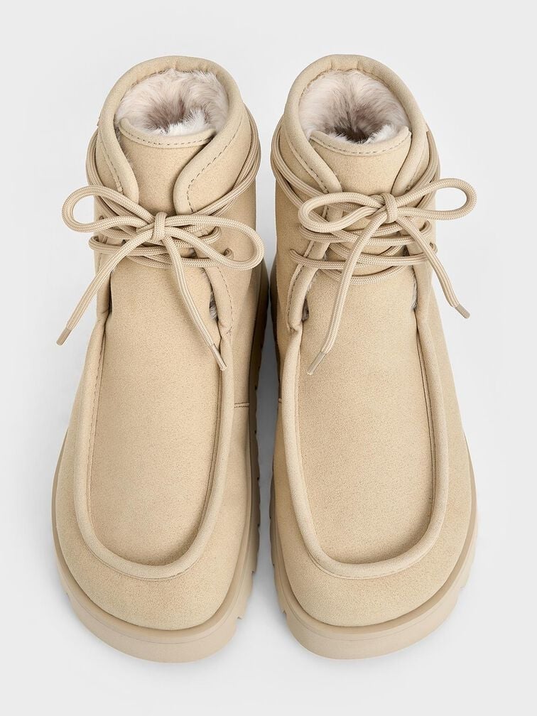 Chukka boots featuring open lacing and two or three pairs of eyelets.