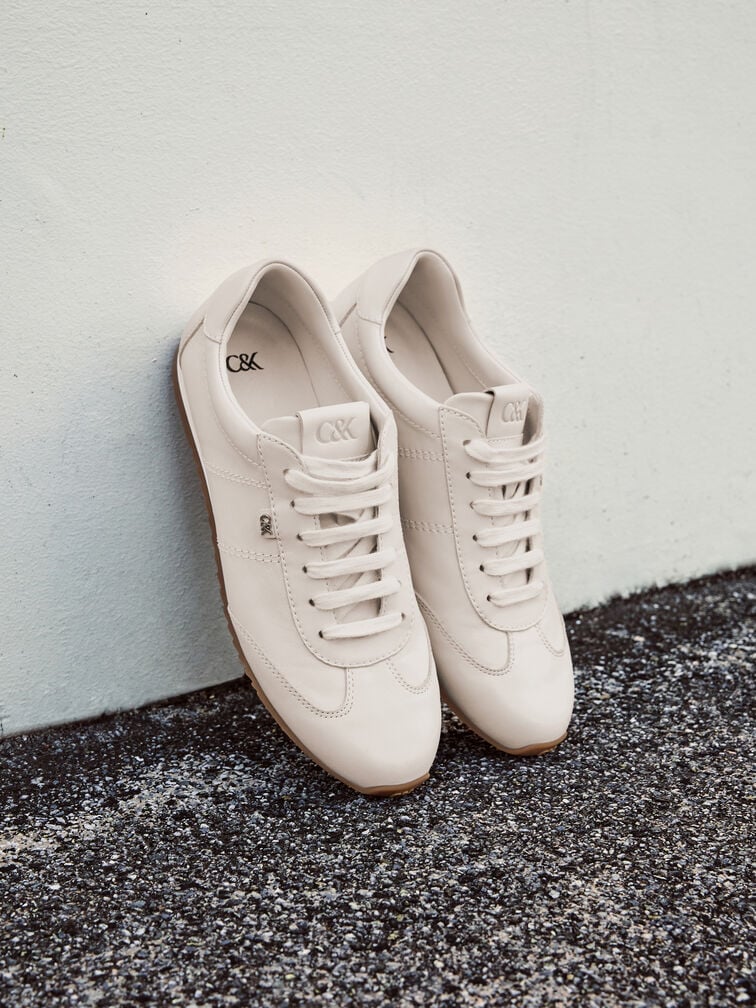 White leather sneakers have to be cleaned with dedicated cleaners and tools.  