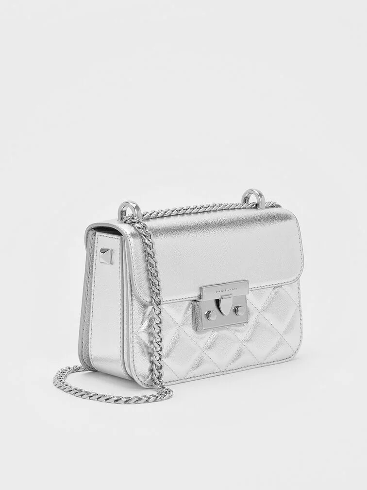 Silver braided top-handle bag, a wonderful accessory choice for white-tie weddings. 