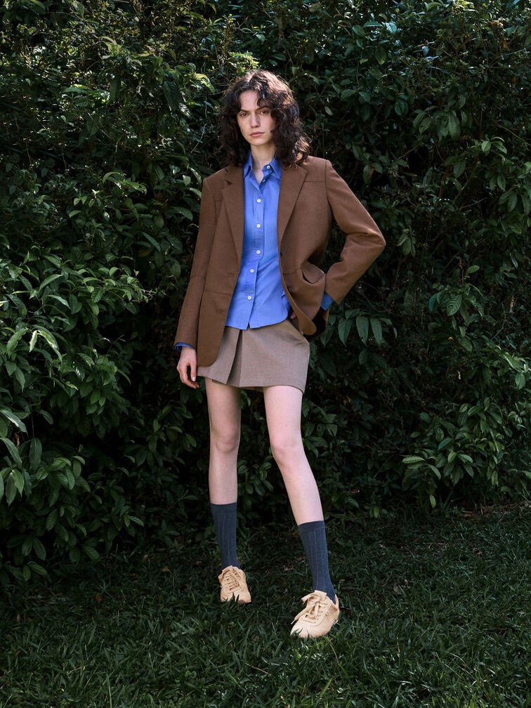 Create a school-friendly look by pairing low-profile sneakers with preppy calf socks. 